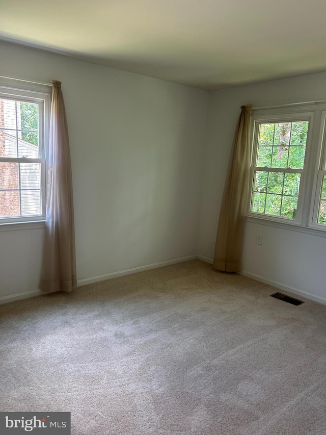 12157 Pineneedle Ct, Woodbridge, VA 22192 - carpeted spare room with baseboards
