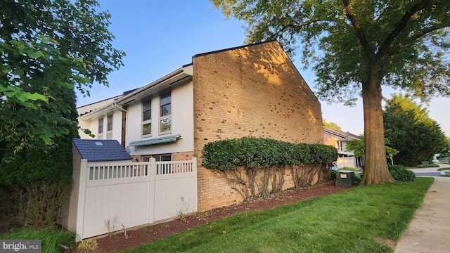 3695 S Leisure World Blvd Unit 14-A, Silver Spring, MD 20906 - view of side of home with brick siding