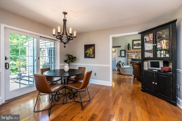 20 Mooney Ln, Chester Springs, PA 19425 - dining room with a chandelier and light wood-style flooring