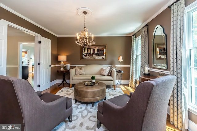 20 Mooney Ln, Chester Springs, PA 19425 - living room featuring a chandelier, healthy amount of natural light, crown molding, and wood finished floors