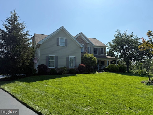1666 Royal Berkshire Cir, West Chester, PA 19380 - view of front of house featuring stone siding and a front yard