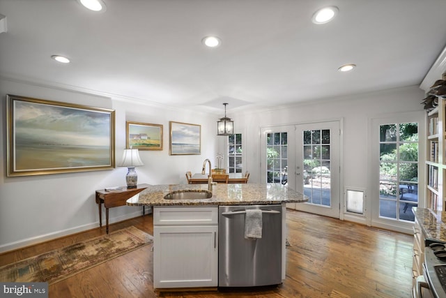 717 S Royal St, Alexandria, VA 22314 - kitchen featuring stainless steel appliances, french doors, light stone counters, wood-type flooring, and decorative light fixtures