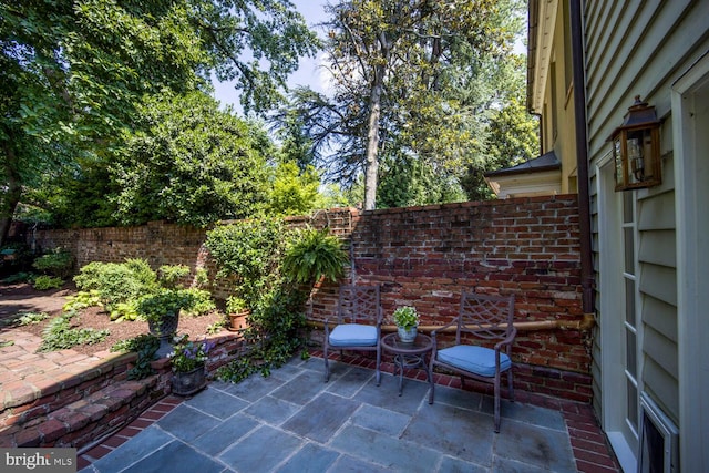 717 S Royal St, Alexandria, VA 22314 - fenced backyard with a patio