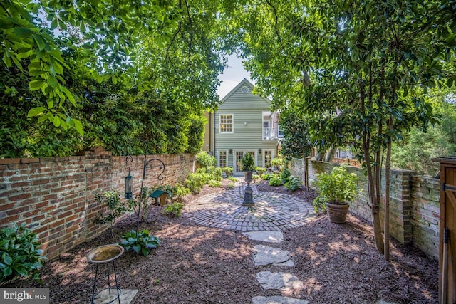 717 S Royal St, Alexandria, VA 22314 - fenced backyard with a patio