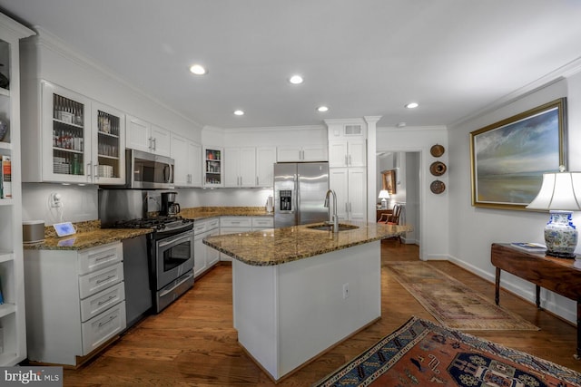 717 S Royal St, Alexandria, VA 22314 - kitchen featuring appliances with stainless steel finishes, ornamental molding, stone counters, white cabinets, and recessed lighting