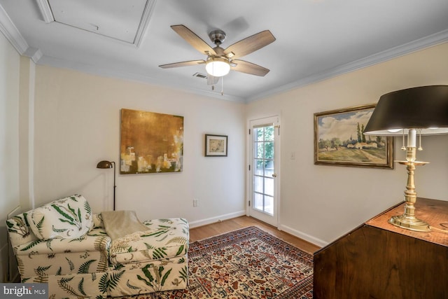 717 S Royal St, Alexandria, VA 22314 - living area with crown molding, wood finished floors, a ceiling fan, and attic access