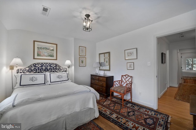 717 S Royal St, Alexandria, VA 22314 - bedroom with wood finished floors