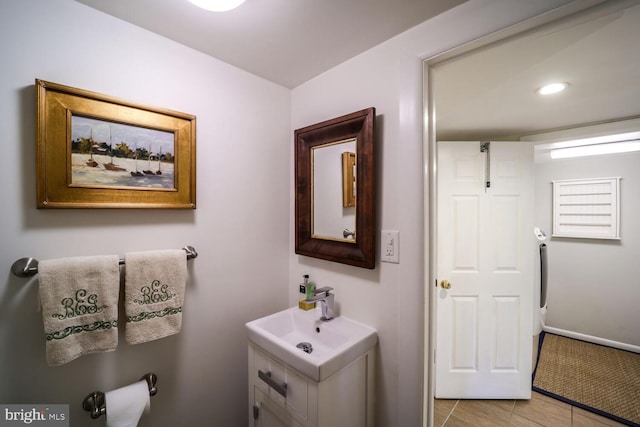 717 S Royal St, Alexandria, VA 22314 - bathroom with vanity, tile patterned flooring, and recessed lighting