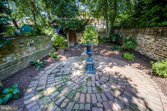 717 S Royal St, Alexandria, VA 22314 - fenced backyard with a patio