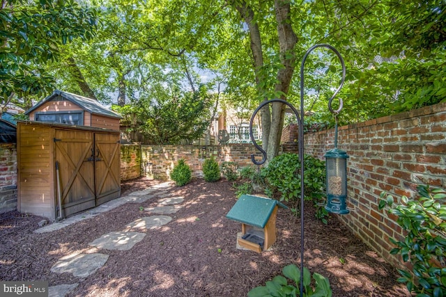 717 S Royal St, Alexandria, VA 22314 - view of yard with a storage shed