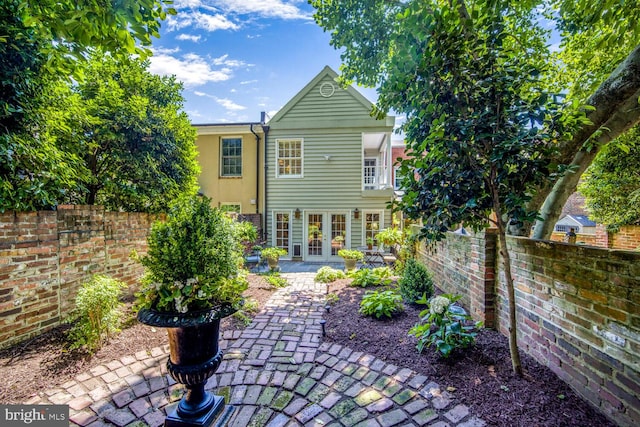 717 S Royal St, Alexandria, VA 22314 - rear view of property featuring french doors, a patio, and stucco siding