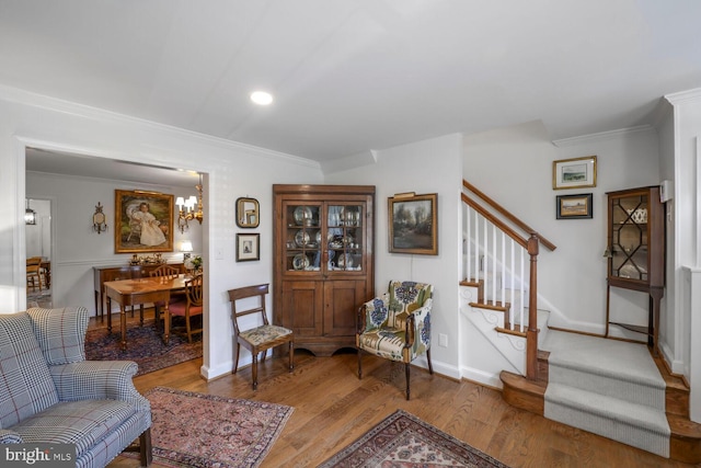 717 S Royal St, Alexandria, VA 22314 - living room with stairway, ornamental molding, wood finished floors, a chandelier, and recessed lighting