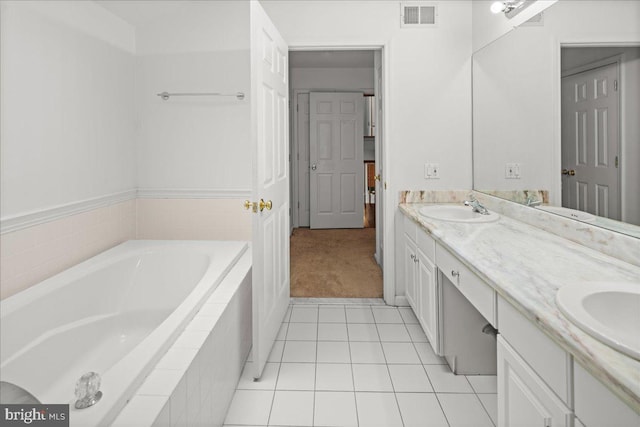 124 Kingsland Cir, Monmouth Junction, NJ 08852 - full bathroom with a bath, double vanity, and tile patterned flooring
