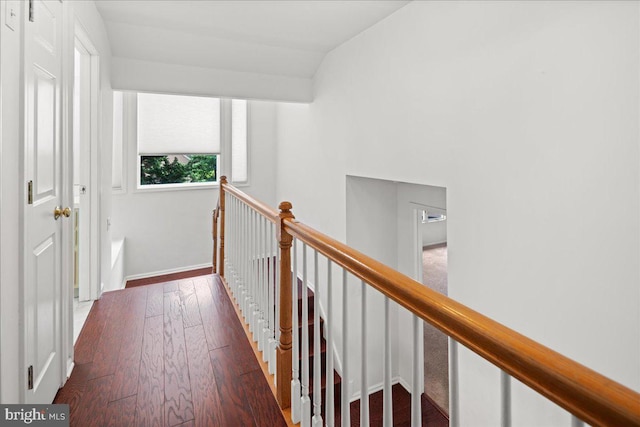 124 Kingsland Cir, Monmouth Junction, NJ 08852 - hallway with an upstairs landing, wood finished floors, and lofted ceiling