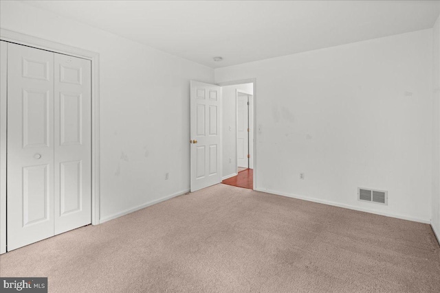 124 Kingsland Cir, Monmouth Junction, NJ 08852 - unfurnished bedroom featuring carpet and a closet