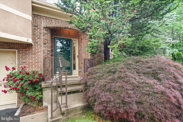 124 Kingsland Cir, Monmouth Junction, NJ 08852 - property entrance featuring brick siding and stucco siding