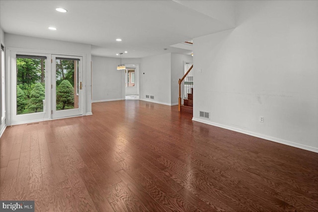 124 Kingsland Cir, Monmouth Junction, NJ 08852 - unfurnished living room featuring stairs, recessed lighting, and dark wood-style flooring