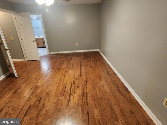 10203 Thundercloud Ct, Springdale, MD 20774 - spare room with a ceiling fan and wood finished floors