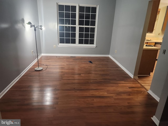 10203 Thundercloud Ct, Springdale, MD 20774 - empty room featuring wood finished floors and baseboards