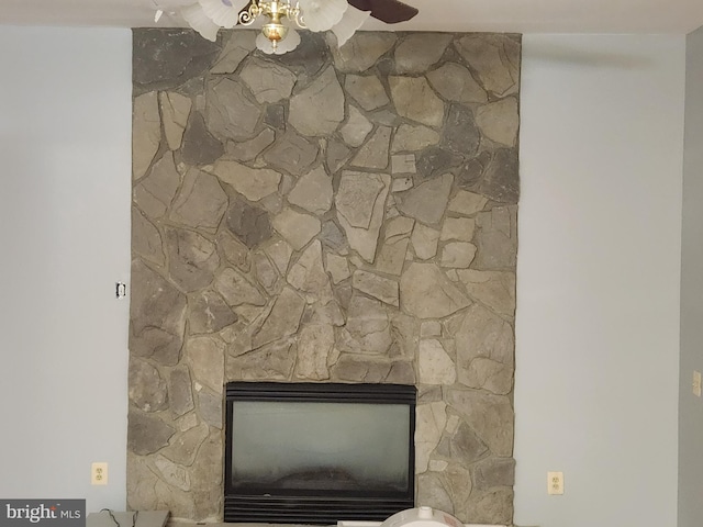10203 Thundercloud Ct, Springdale, MD 20774 - detailed view of a ceiling fan and a stone fireplace