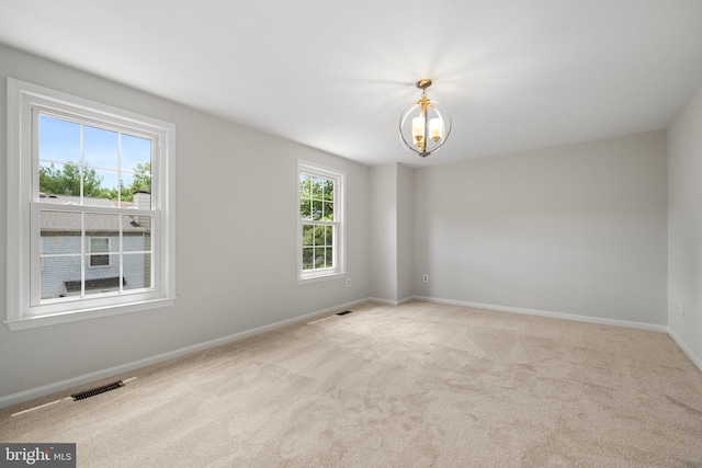 6558 Lochleigh Ct, Alexandria, VA 22315 - carpeted spare room with baseboards and a chandelier