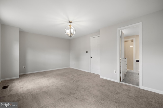 6558 Lochleigh Ct, Alexandria, VA 22315 - carpeted empty room featuring baseboards and a chandelier