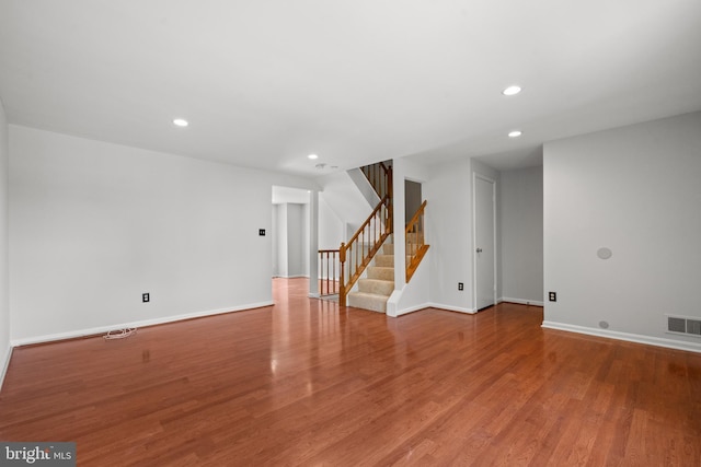 6558 Lochleigh Ct, Alexandria, VA 22315 - empty room with stairway, recessed lighting, and wood finished floors