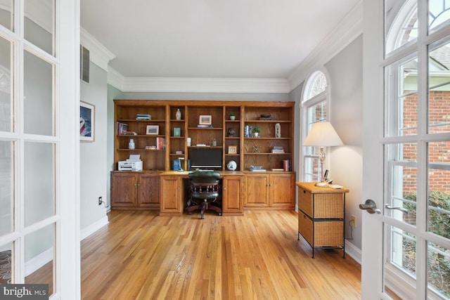 14309 Cervantes Ave, Darnestown, MD 20874 - office with light wood-style flooring, built in desk, and ornamental molding