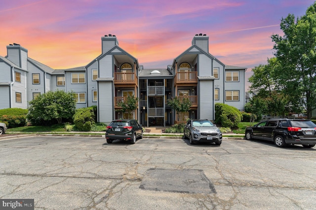6905 Victoria Dr Unit 6905-L, Alexandria, VA 22310 - view of building exterior with uncovered parking