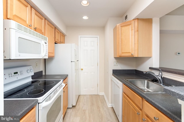 6905 Victoria Dr Unit 6905-L, Alexandria, VA 22310 - kitchen featuring white appliances, light wood-style flooring, light brown cabinetry, dark countertops, and recessed lighting