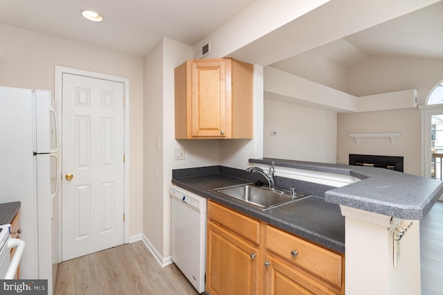 6905 Victoria Dr Unit 6905-L, Alexandria, VA 22310 - kitchen with white appliances, light wood-type flooring, dark countertops, a peninsula, and light brown cabinetry