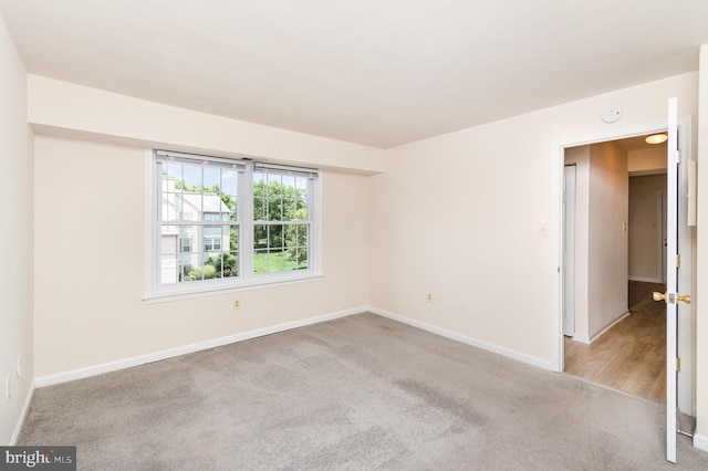 6905 Victoria Dr Unit 6905-L, Alexandria, VA 22310 - unfurnished room featuring carpet floors and a smoke detector