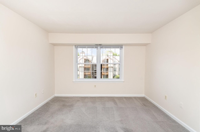 6905 Victoria Dr Unit 6905-L, Alexandria, VA 22310 - spare room featuring carpet and baseboards
