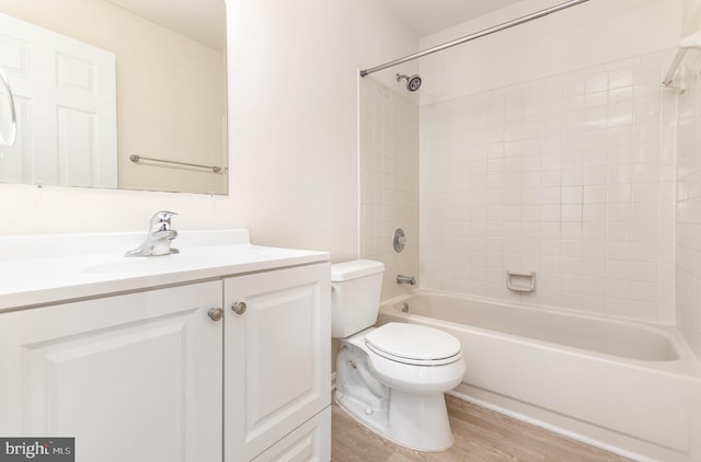 6905 Victoria Dr Unit 6905-L, Alexandria, VA 22310 - bathroom featuring vanity, wood finished floors, and  shower combination