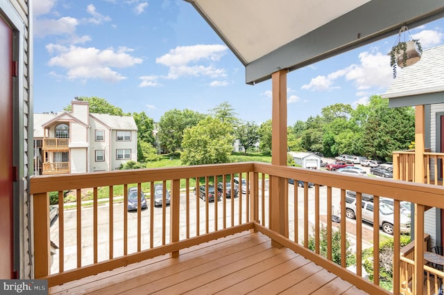 6905 Victoria Dr Unit 6905-L, Alexandria, VA 22310 - wooden terrace with view of wooded area