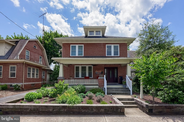 76 N Grant St, Manheim, PA 17545 - american foursquare style home featuring covered porch and brick siding