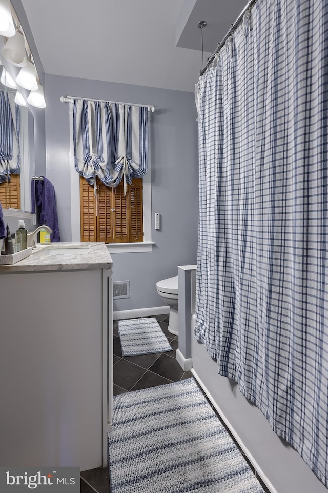 76 N Grant St, Manheim, PA 17545 - bathroom featuring vanity, tile patterned floors, and curtained shower
