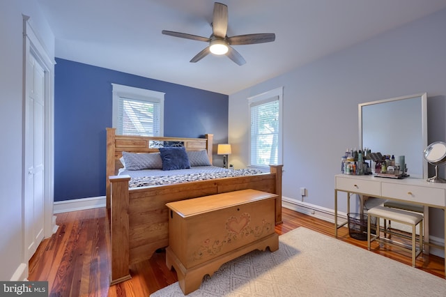 76 N Grant St, Manheim, PA 17545 - bedroom featuring wood finished floors, a baseboard radiator, and ceiling fan