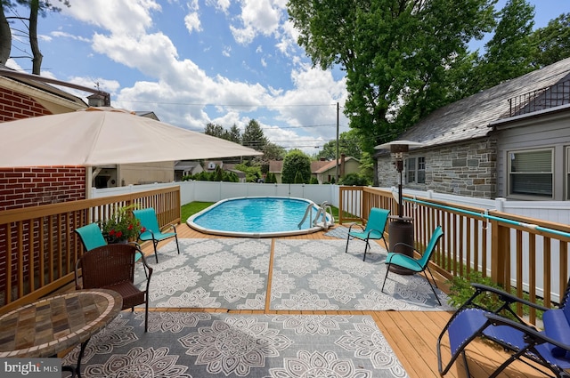 76 N Grant St, Manheim, PA 17545 - view of pool featuring a deck and a fenced backyard