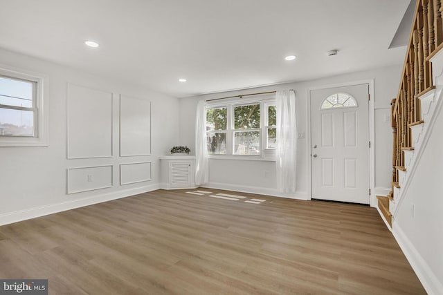 1700 Melbourne Rd, Baltimore, MD 21222 - foyer with stairs, light wood finished floors, and recessed lighting