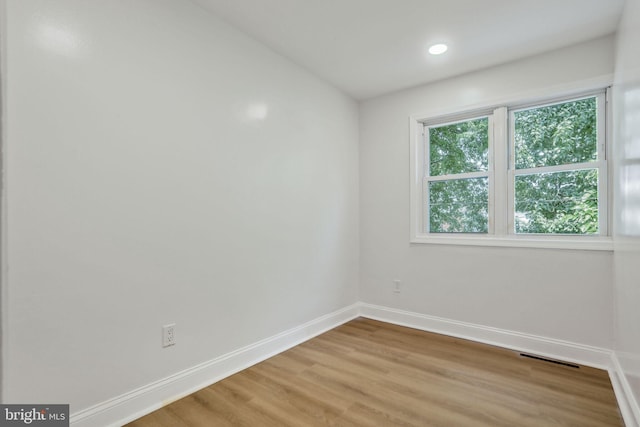 1700 Melbourne Rd, Baltimore, MD 21222 - empty room featuring light wood-type flooring and recessed lighting