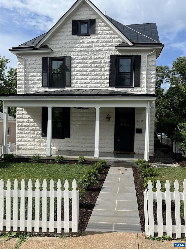 1108 E Jefferson St, Charlottesville, VA 22901 - view of front of house featuring a standing seam roof, covered porch, and a metal roof
