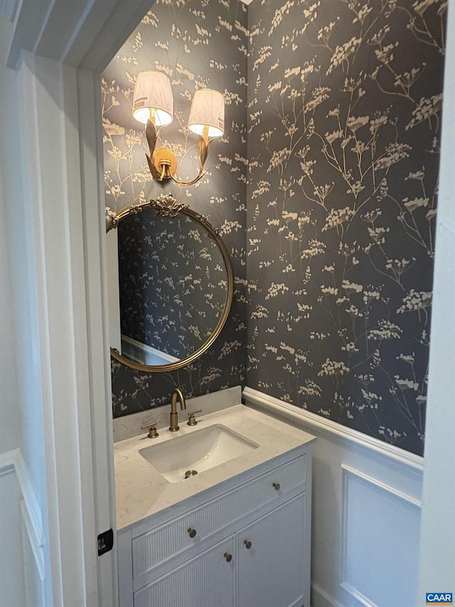 1108 E Jefferson St, Charlottesville, VA 22901 - bathroom with a wainscoted wall, wallpapered walls, vanity, and a decorative wall