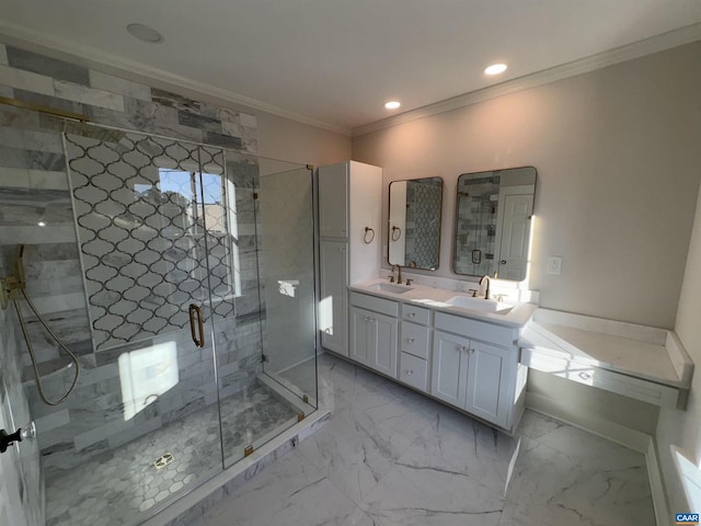 1108 E Jefferson St, Charlottesville, VA 22901 - bathroom featuring double vanity, ornamental molding, a stall shower, recessed lighting, and marble finish floors