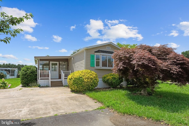 15 Bristol Way Unit 36841, Lewes, DE 19958 - manufactured / mobile home with a porch