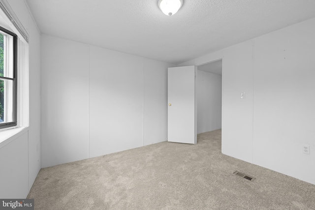15 Bristol Way Unit 36841, Lewes, DE 19958 - carpeted empty room featuring a textured ceiling