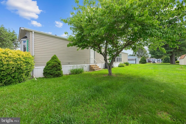 15 Bristol Way Unit 36841, Lewes, DE 19958 - view of grassy yard featuring entry steps