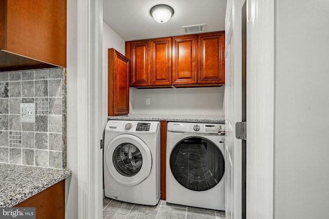 1225 Shenkel Rd, Pottstown, PA 19465 - laundry area featuring independent washer and dryer and cabinet space