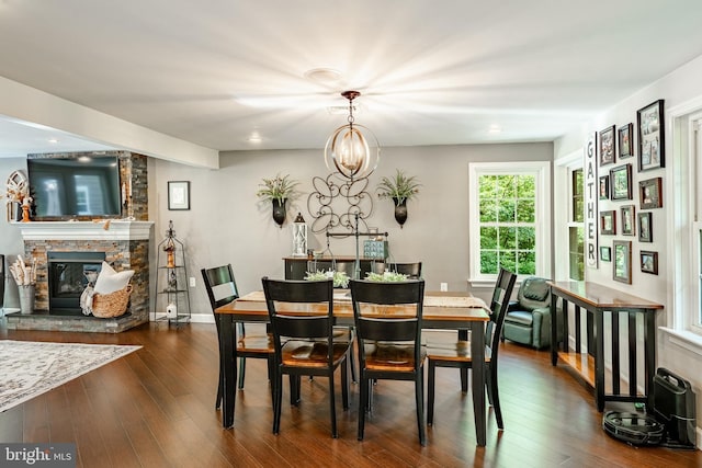 1225 Shenkel Rd, Pottstown, PA 19465 - dining space featuring a fireplace, dark wood-type flooring, and recessed lighting