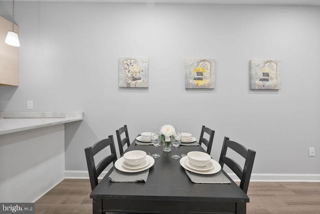 1815 N Warwick Ave, Baltimore, MD 21216 - dining space featuring wood finished floors
